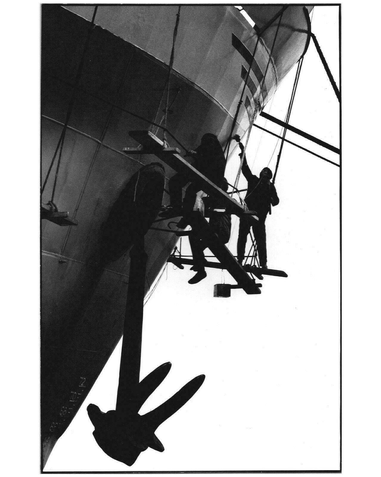 ANDRE BRUERE Men Cleaning a Boat c. 1970 Photography image 1